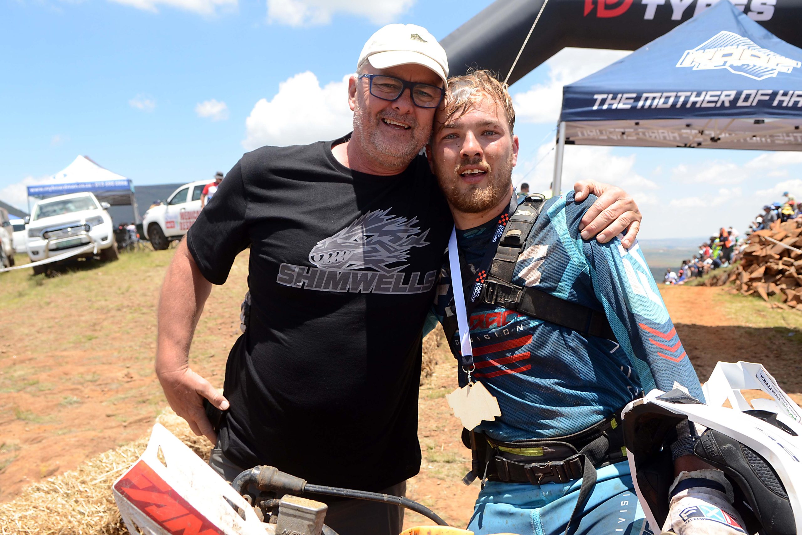 Adriaan du Toit and his Dad celebrate his Silver finish